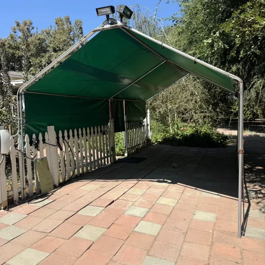 Custom green vinyl canopy roof and side panels