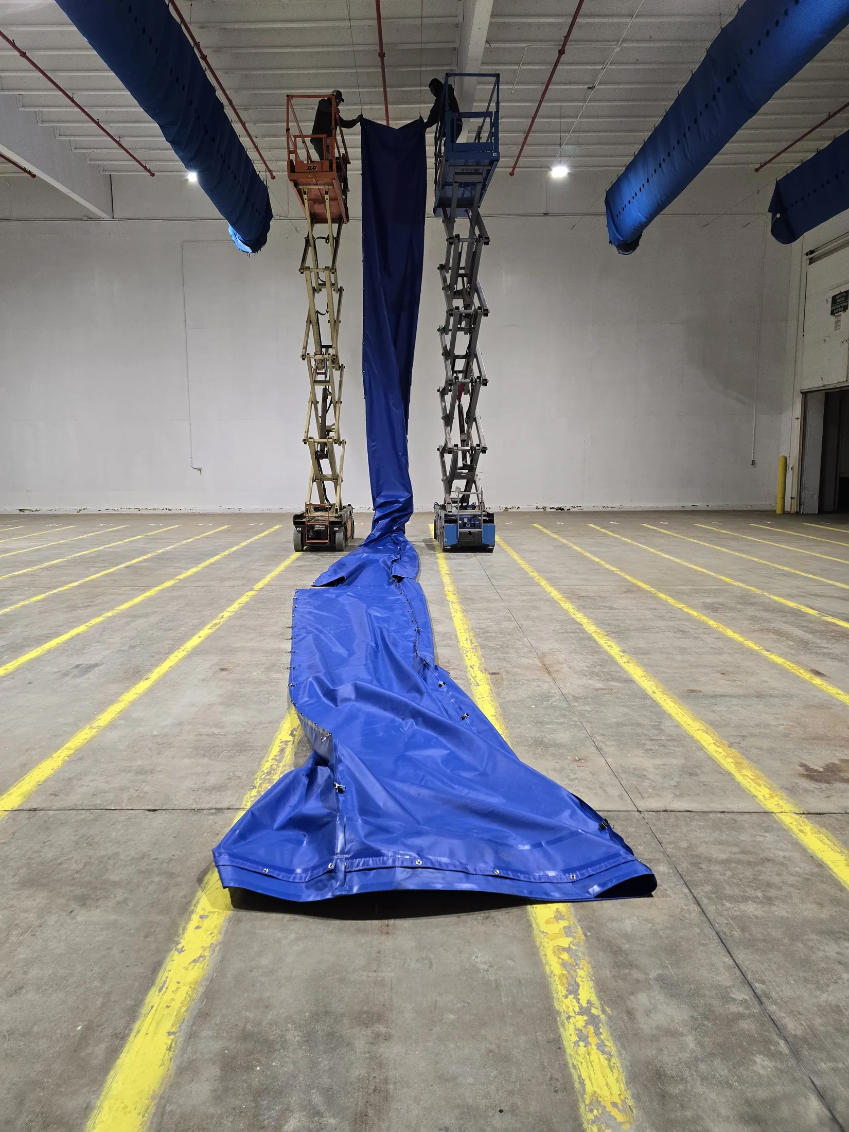 Industrial vinyl curtain installed inside a commercial facility
