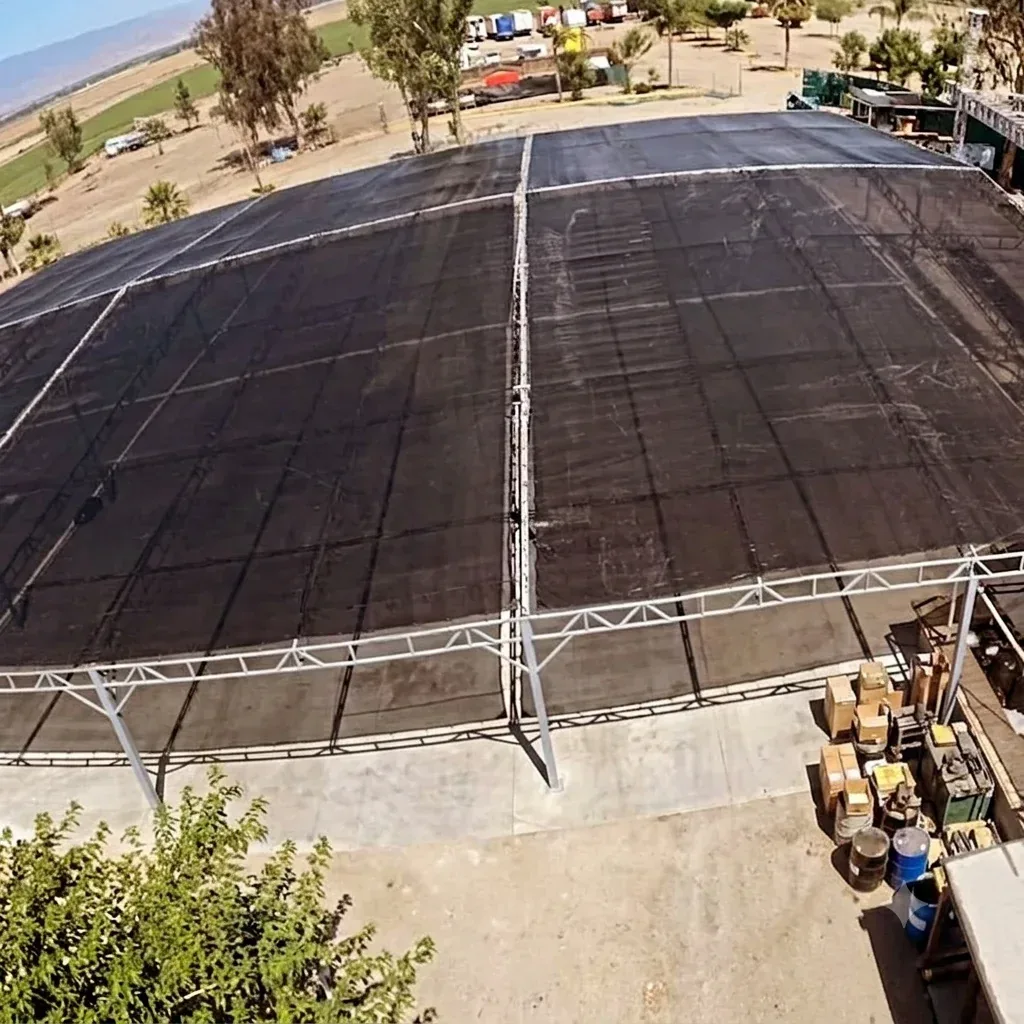 Large custom shade mesh panels fabricated for a commercial yard
