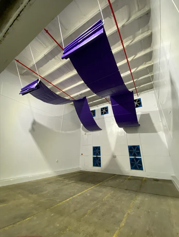 Heavy-duty custom vinyl curtains fabricated inside a commercial facility