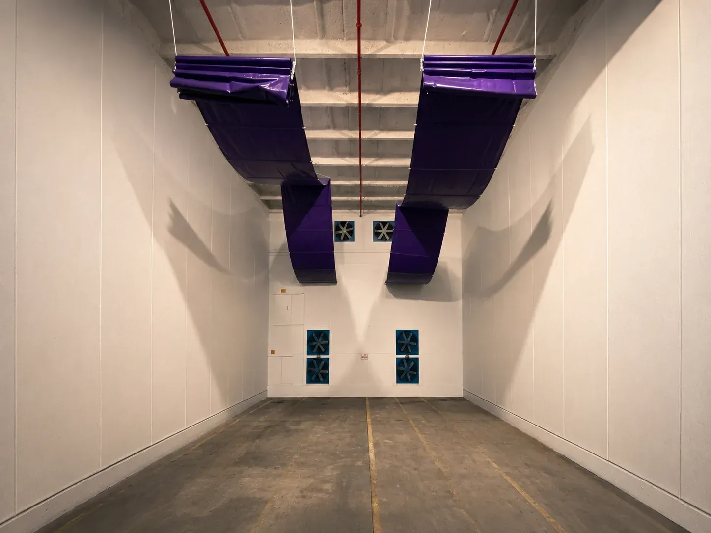 Heavy-duty custom vinyl curtain panels for a commercial facility